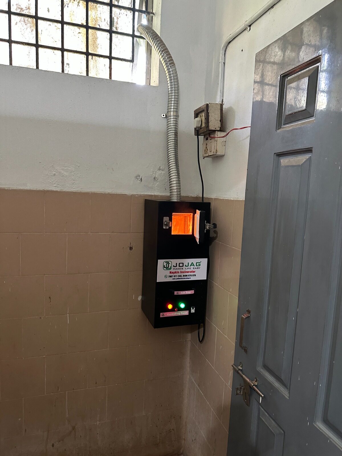 20 pad/cycle napkin incinerator installed inside the Science College toilet.